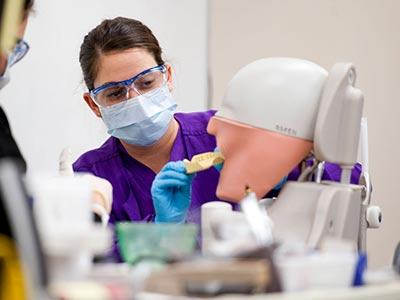 Dental student in class